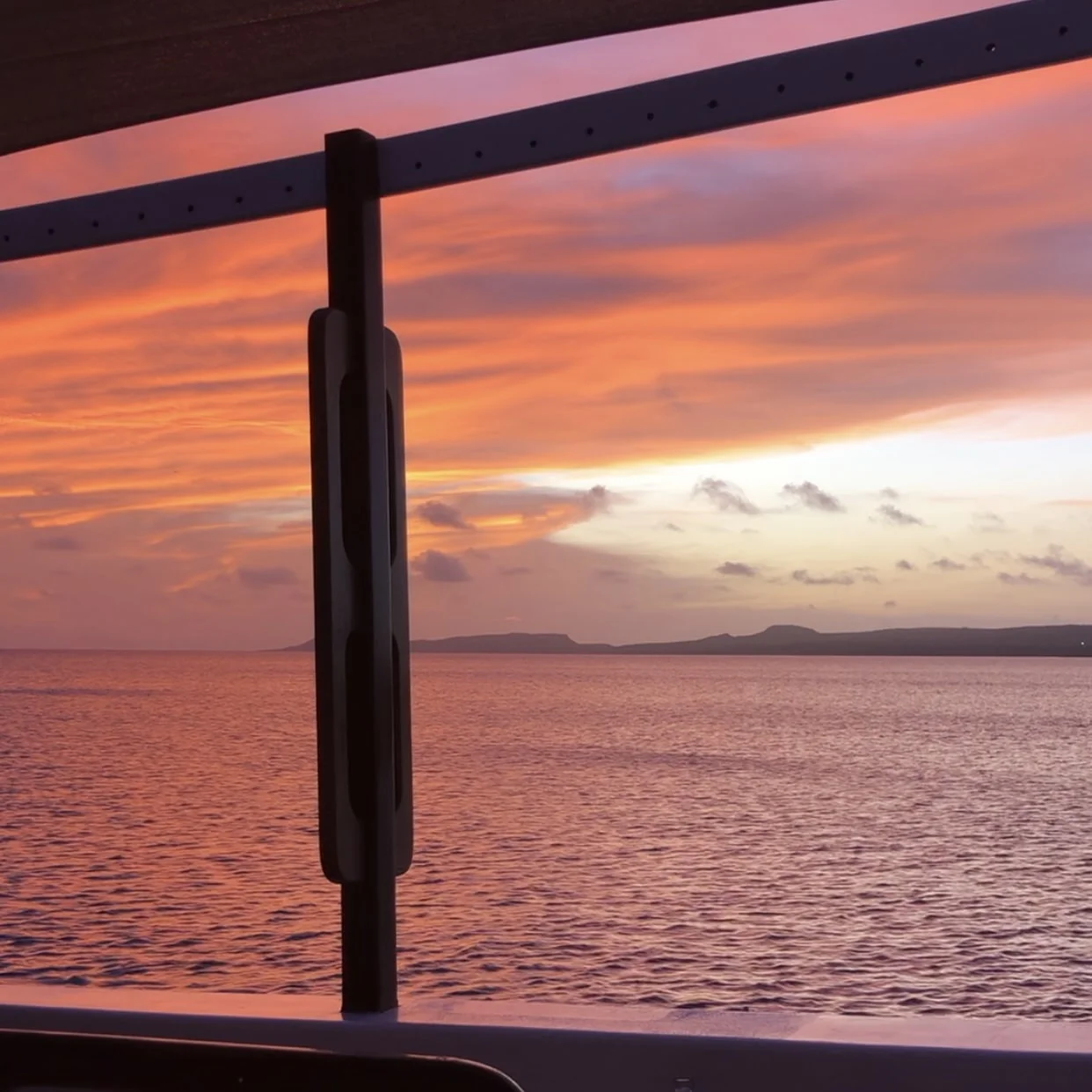 Golden Caribbean sunset over Bonaire's harbour